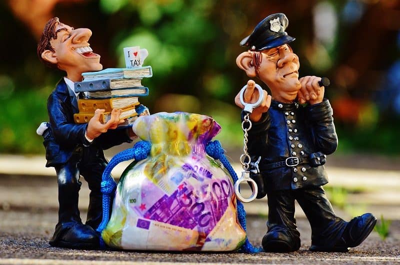 tax evasion and cop figurines
